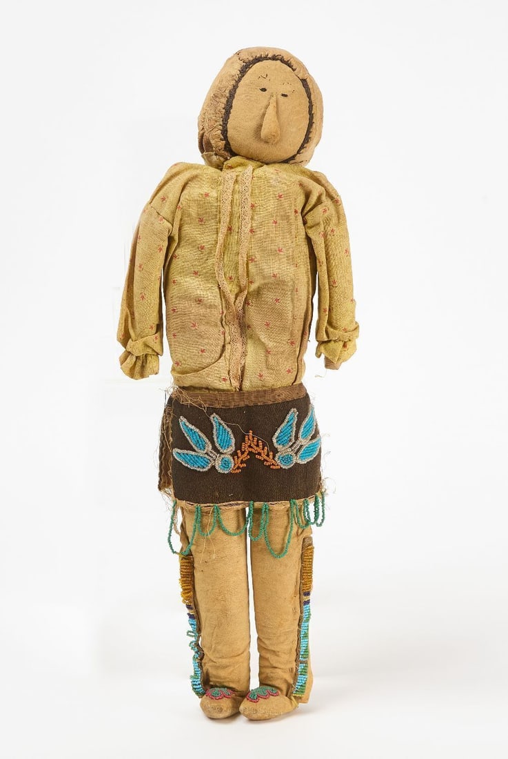 Large Great Lakes Doll: Large Great Lakes region Native doll. Glass beads on hide and fabric. circa 1900.H 19 in. 