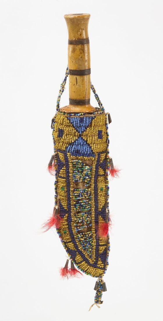 Native Knife Sheath: Native knife sheath with knife. Beadwork on hide. Sinew and thread sewn. Plains region, circa 1895. L 9 in.