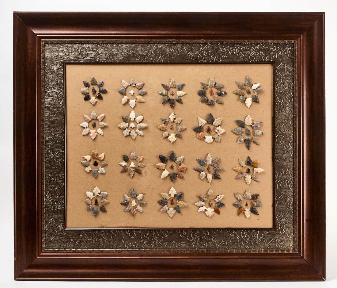 Framed Series of Native American Arrowheads: Framed series of Native American arrowheads displayed in star form. Approximately 180 pcs. Modern frame (no glass).H 36-3/4 in. W 42-1/2 in.