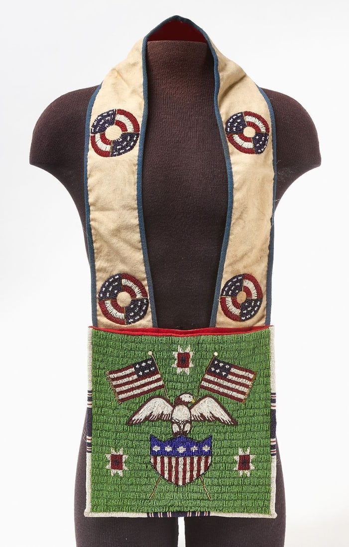 Woodlands Beaded Bandolier Bag: Woodlands bandolier bag with patriotic motifs. Circa 1940.H 28 in. W 12 in. 