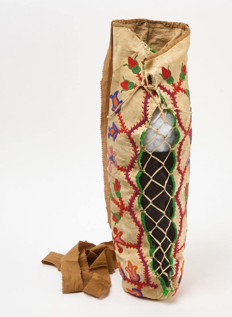 Cree Papoose Carrier: Cree (or possibly Bannock) papoose carrier. Beadwork and soft hide. Circa 1930. L 22 in.