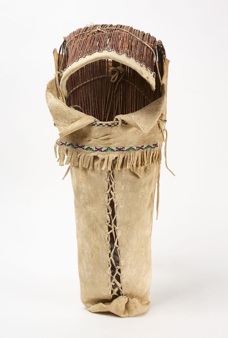 Ute Cradle Board: Native America beaded hide cradle board. Ute or Plateau, 19th century. L 30-1/2 in. W 11 in.