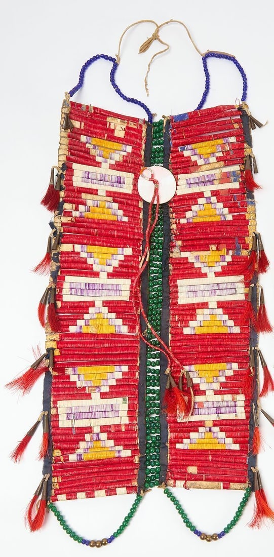 Native American Breastplate: Breastplate with quill, tin cones and beads on hide.L 18 in.