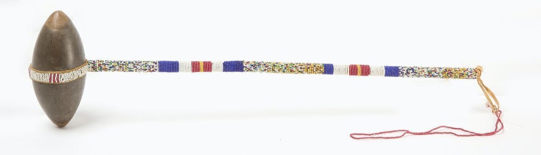 Sioux Skull Cracker: Sioux skull cracker with beadwork handle. early 20th century. L 22-1/2 in.