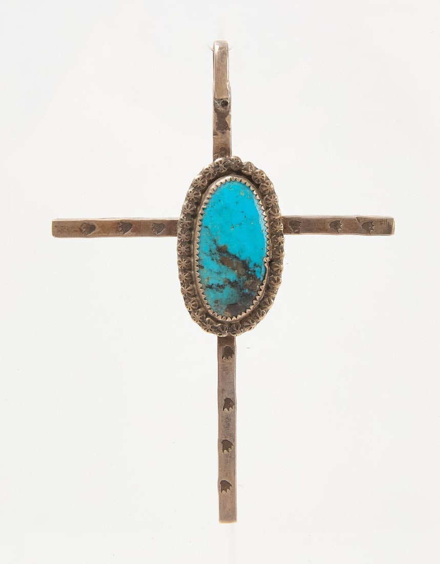 Navajo Silver Cross: Navajo stamped ingot silver cross. Large turquoise cabochon. Thick ingot silver with deep stamped designs. circa 1900-1910.L 4-1/4 in. W 3 in.