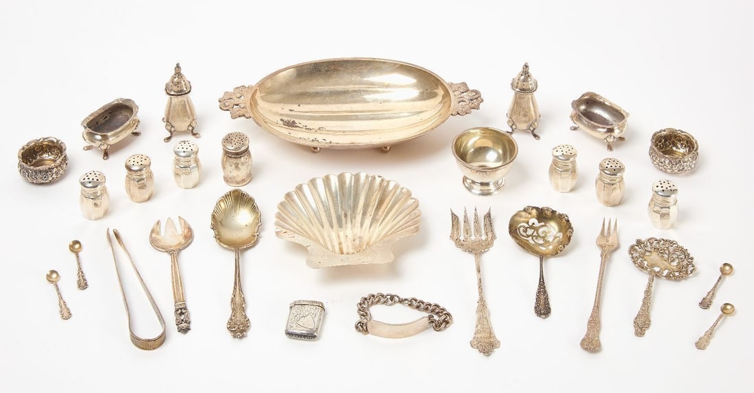 Group of Estate Sterling Silver with Tiffany & Co: Group of estate sterling silver items. Tiffany & Co handled oval dish, Tiffany & Co 3-pronged fork, set of 6 Neiman Marcus salt/pepper shakers, 2 pairs of open salts, pair of footed salt/peppe