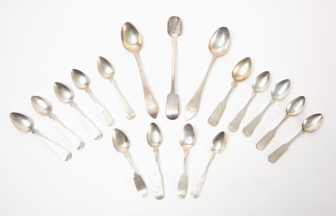 Group of Coin Silver Spoons and Sterling Marrow Scoop: Group of 7 coin silver spoons by A. Skinner, 7 other assorted coin silver spoons, 2 large coin silver spoons stamped E. Burr, and an early English sterling marrow scoop. Coin Weight: 10.8 ozt.St