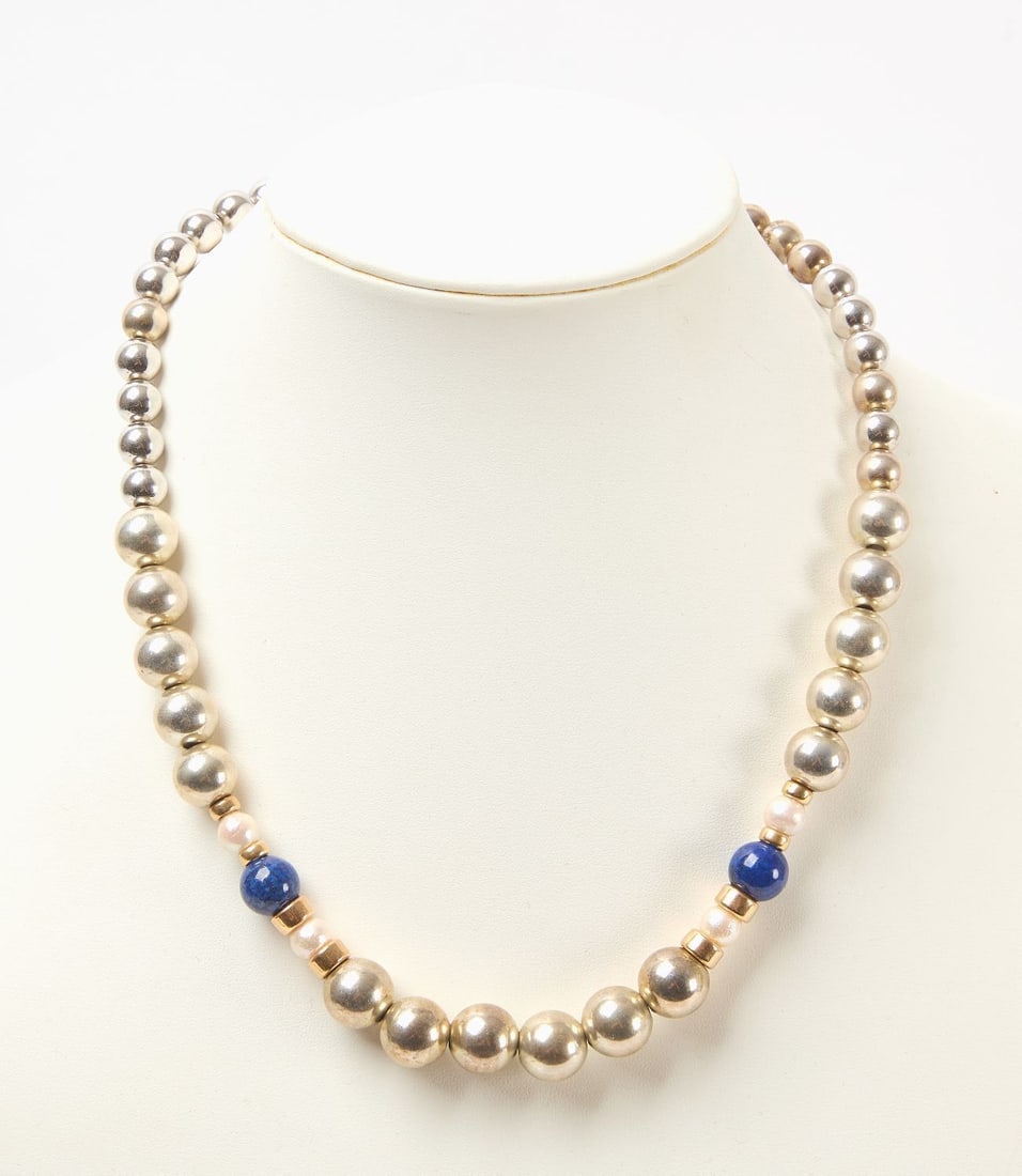 14k Clasp and Sterling Silver Beaded Necklace with Lapis Lazuli: Sterling beaded necklace with 14k clasp and spacers, as well as 2 lapis beads. L 8-1/2 in. Weight: 1.4 ozt.