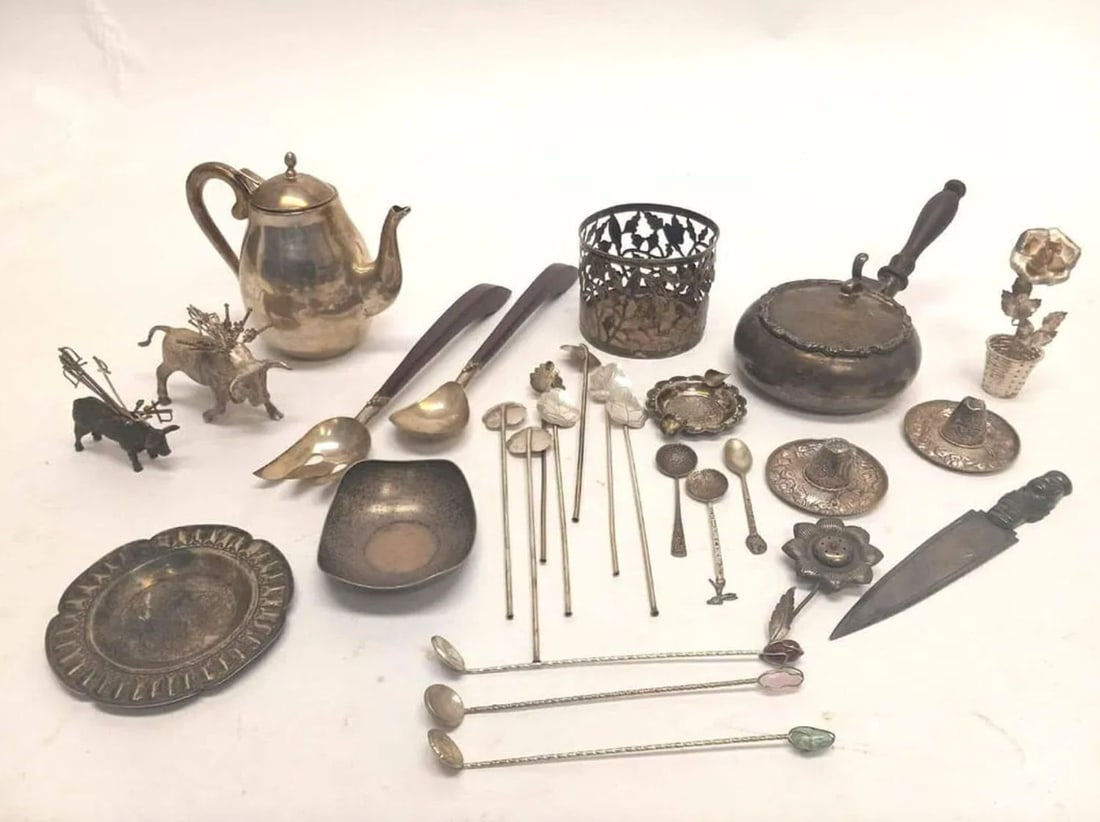 Group of Mexican Silver: Group of Mexican silver, mostly sterling. Includes figural pieces, a coffee pot, several wood-handle items, and others as shown.Total Weight: 45.5 ozt.