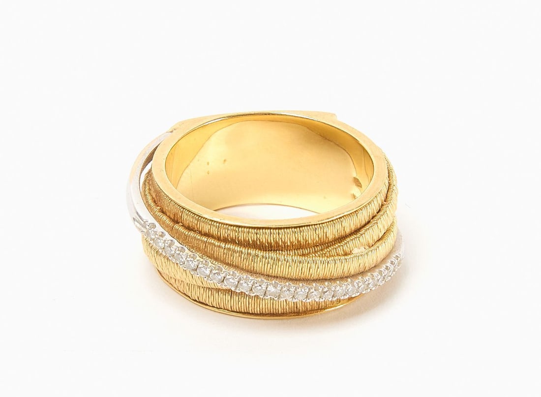 18k Marco Bicego Cairo Ring: 18k yellow gold 7-strand ring with diamonds. Custom made in 2015. Size 11.5. Weight: 12.5 dwt.Provenance: Mulloys Fine Jewelry.