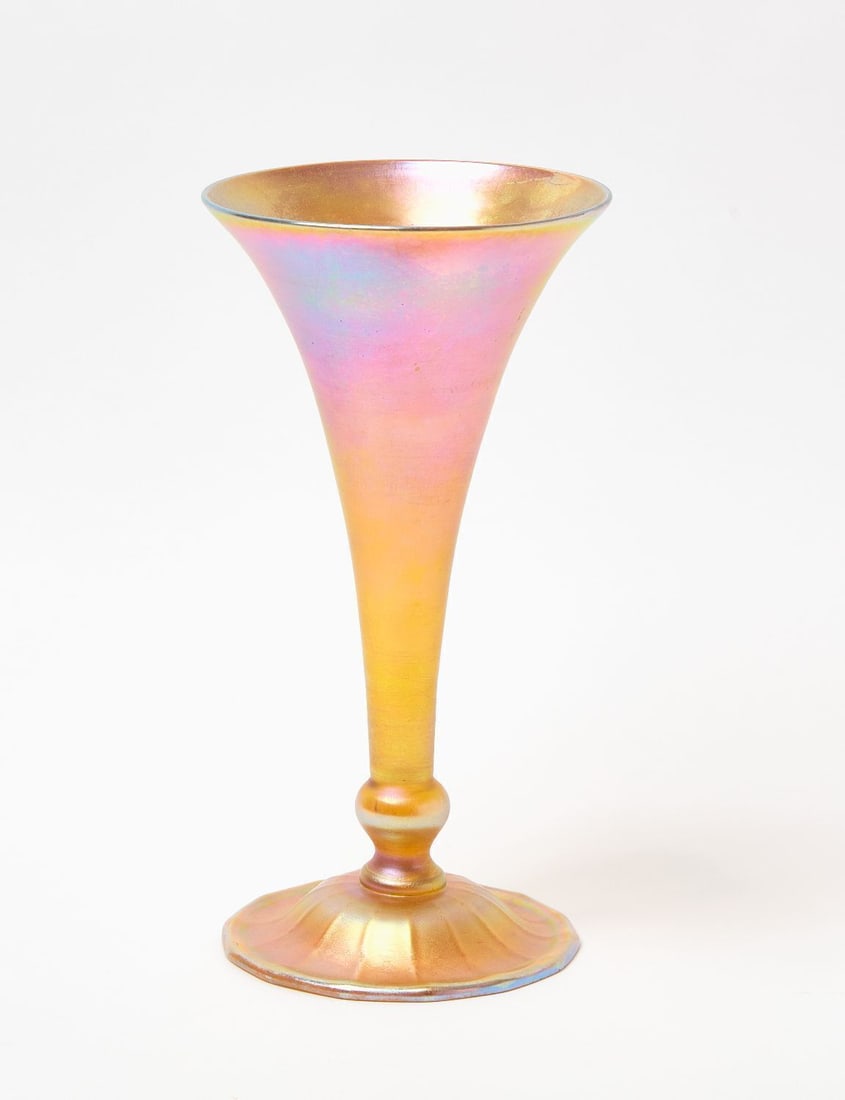 Tiffany Studios Favrile Glass Trumpet Vase: Tiffnay Studios Favrile glass trumpet vase. Iridescent finish. Marked 'L.C.Tiffany - Favrile' with number to underside. American, circa 1920.H 11-3/4 in.