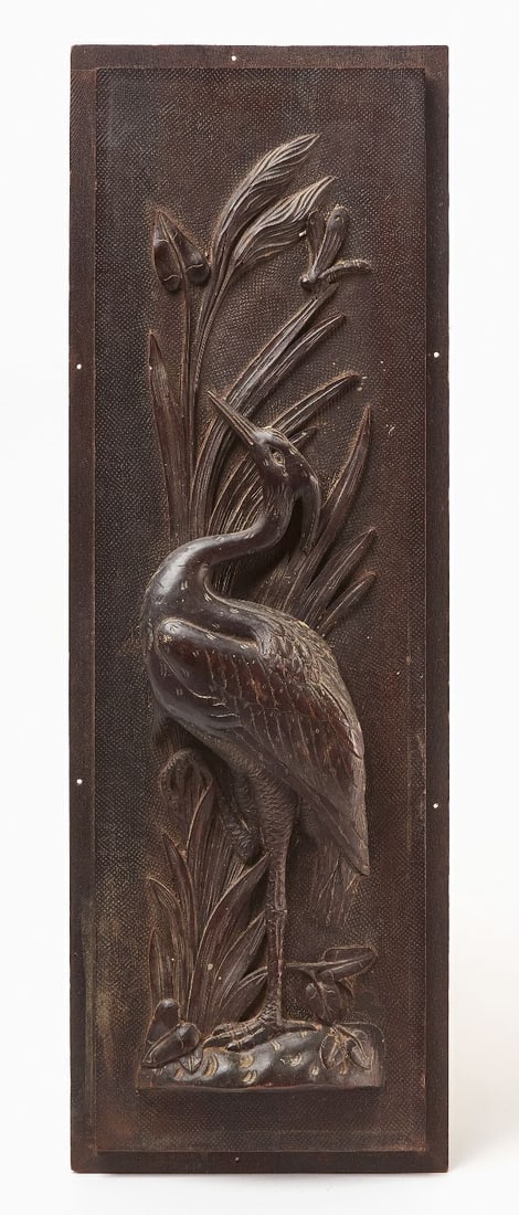 Relief Carved Heron Plaque: Plaque depicting a heron in a marshland setting. High-relief carved wood. H 28 in. W 9-1/2 in.