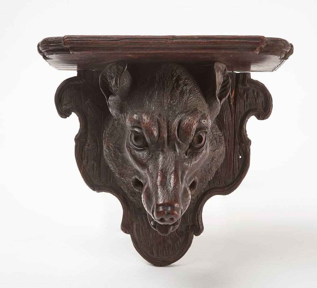Black Forest Wolverine Wall Shelf: Black Forest wolverine or wolf wall shelf. Carved wood. German or Austrian, late 19th century.H 10-1/4 in. W 11 in. D 6-1/2 in.