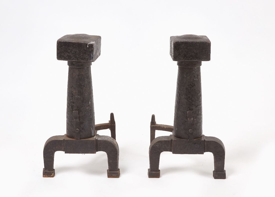 Pair of Brutalist Andirons: Large pair of brutalist andirons. Hollow iron. Late 19th century. H 23-1/2 in. L 13-1/4 in. W 12-3/4 in.
