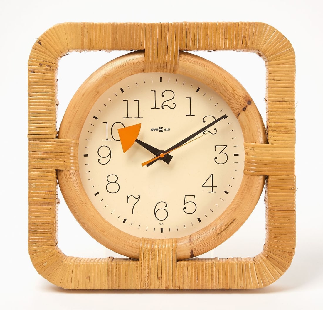 Howard Miller MCM Rattan Basket Clock: Howard Miller MCM rattan basket clock with original box. Battery movement. America, circa 1980. Clock: H 14-1/8 in. W 14 in.