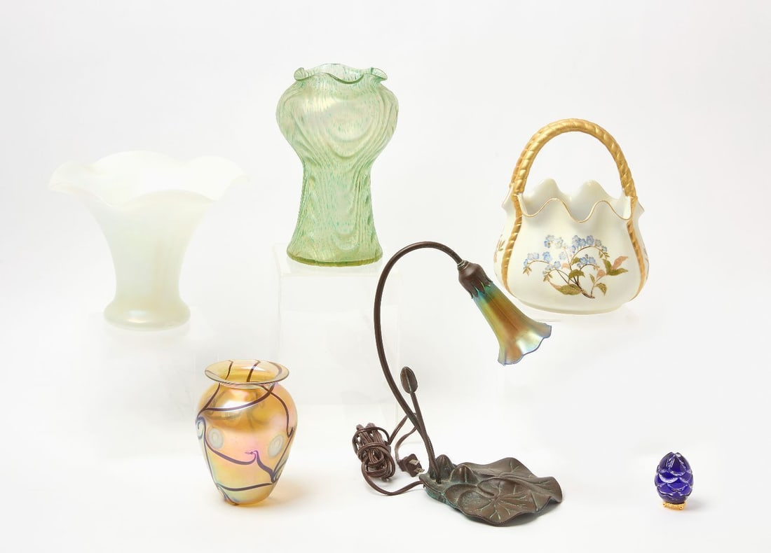 Group of Glass and Ceramics with Lily Lamp and Fabrege Egg: A grouping of six items to include a colbalt blue etched glass Faberge egg (pinecone), signed and numbered 2281, a Tiffany style bronze lily lamp, two iridescent glass vases (smaller dated 1998 undern