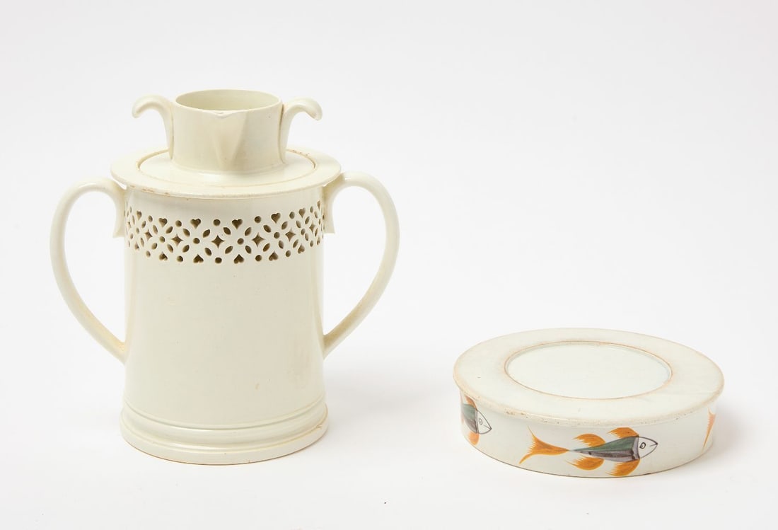 Two Early Liverpool Items: Two early Liverpool items. The first, reticulated server with hearts in three sections. The second a polychrome char dish fish. Three part server H 8-3/4 in. Char dish: D 6-1/2 in.