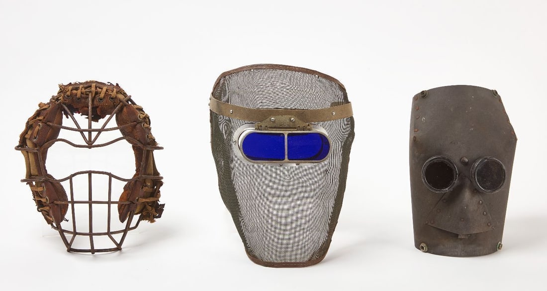 Three Structural Vintage Masks: Group of three structural vintage masks featuring one metal welding mask with original blue glass lenses and mesh, one replica GP-5 gas mask (Soviet-era), and one leather 'Goggle' eye catchers