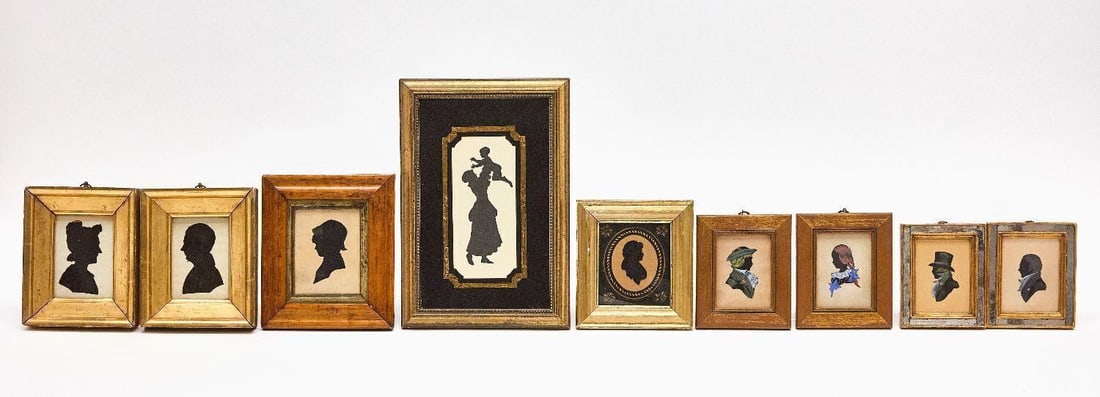 Collection of English Silhouettes: Collection of framed English Silhouettes. Includes ten total sihlouettes, with three pairs in matching frames. One reverse painted glass silhouette of a woman with an eglomise oval mat, four paper cut