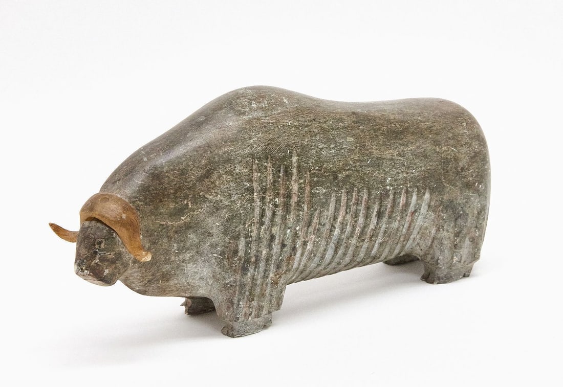 Inuit Carved Soapstone Muskox: Inuit Carved Muskox. Soapstone (steatite) with bone horns. Mid-20th century. H 6-3/8 in. W 3 in. L 13-1/4 in.