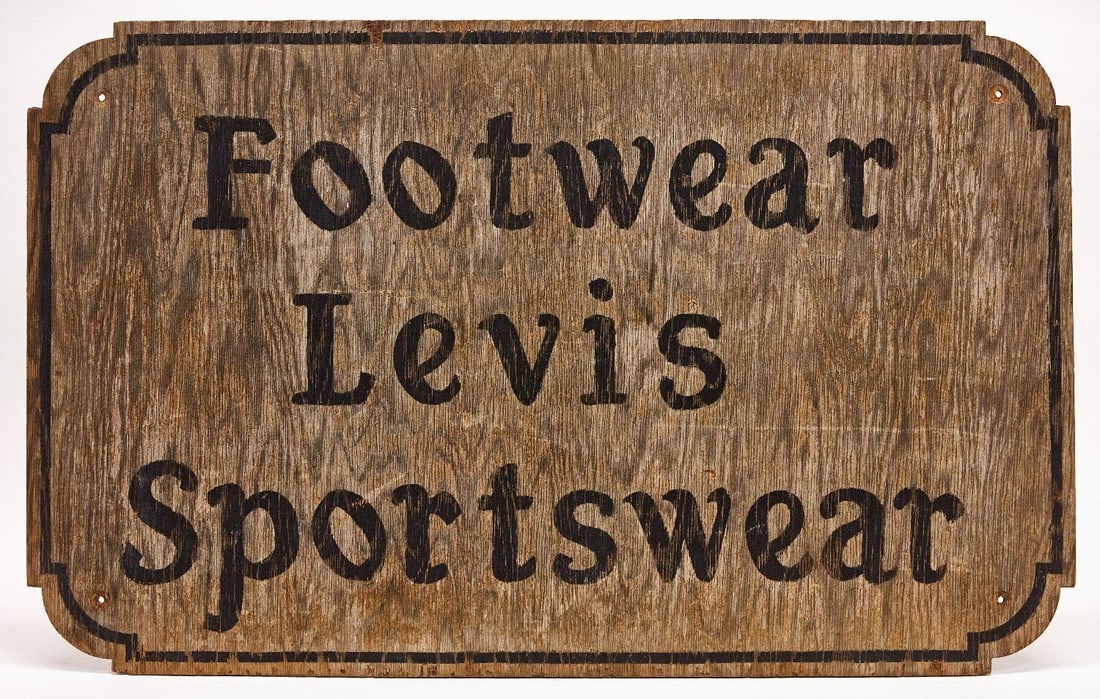 Trade Sign - Footwear, Levis, Sportswear: Trade sign reading 'Footwear, Levis, Sportswear'. Single-sided paint on plywood. American, circa 1960.H 30 in. W 48 in.