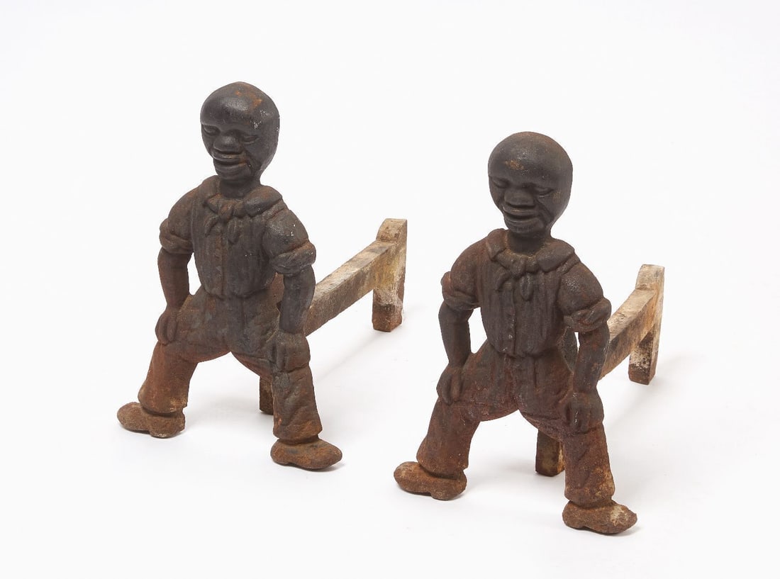 Pair of Black Figural Andirons: Pair of andirons with Black figures. Cast Iron. America, early 20th century. H 17-1/2 in. W 12 in. D 20 in.