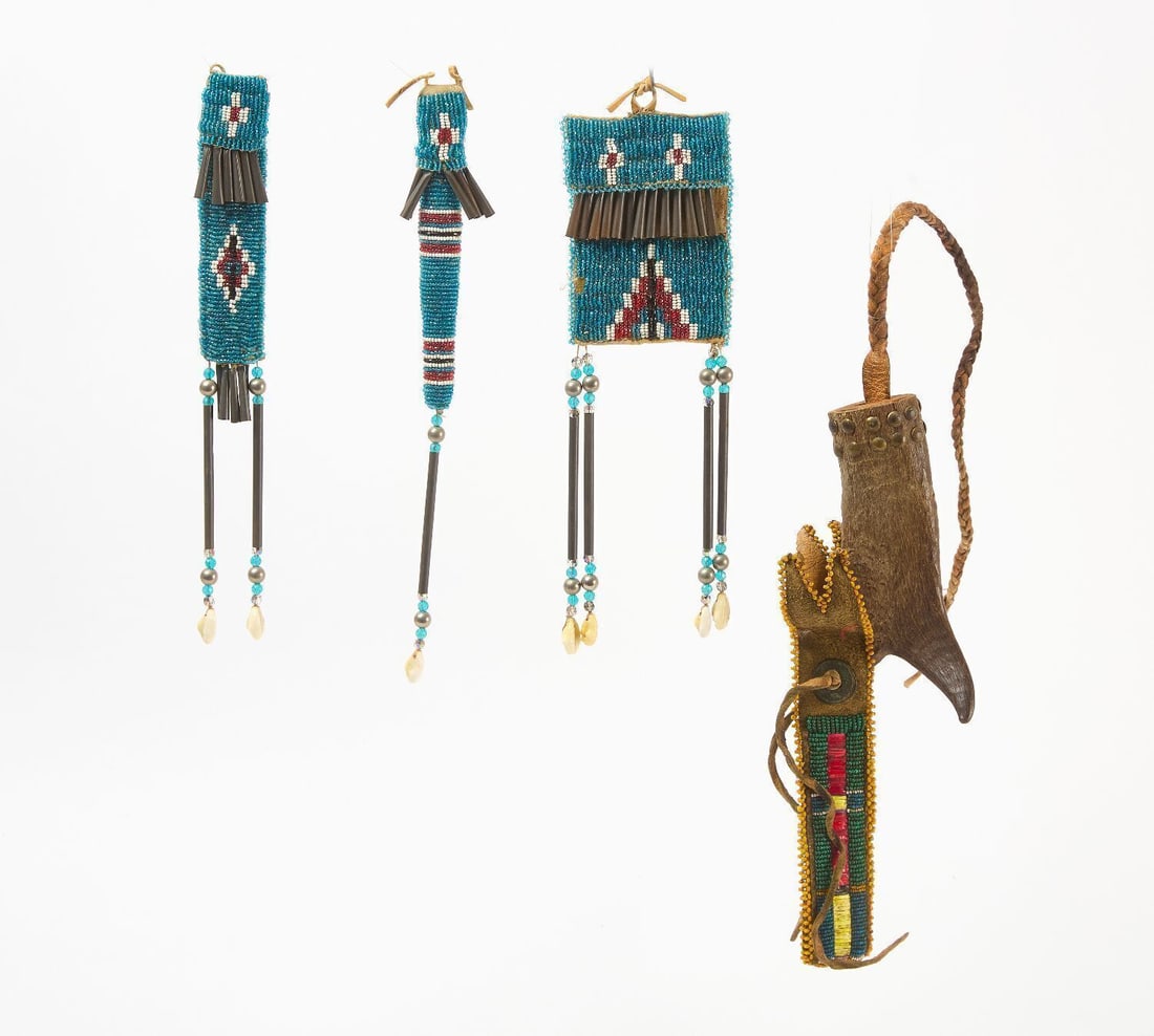 Group of Beadwork: Group of Native beadwork. Including a three piece suite including two awl cases and a pouch. Glass beads on hide with tin cones. Mid 20th century. Together with a beaded and quilled quirt.