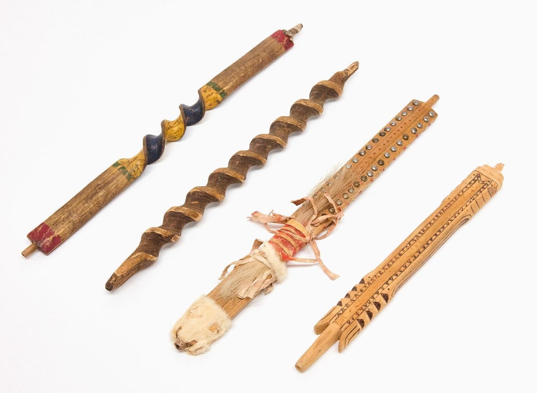 Four Sioux Beaded and Carved Catlinite Pipe Stems: Four Sioux beaded and carved catlinite pipe stems. Late 19th - Early 20th century.L 21-1/2 in.L 20-1/4 in.L 18-1/2 in.L15-3/4 in.