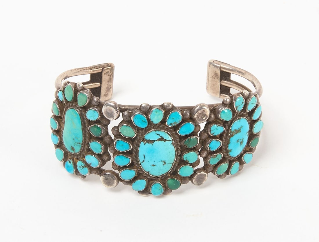 Navajo Turquoise and Silver Cuff Bracelet: Navajo turquoise and silver cuff bracelet. Southwestern US, 20th century. Total Weight: 1.6 ozt. Outer W: 2-5/8 in., Inner W: 2-1/2 in.
