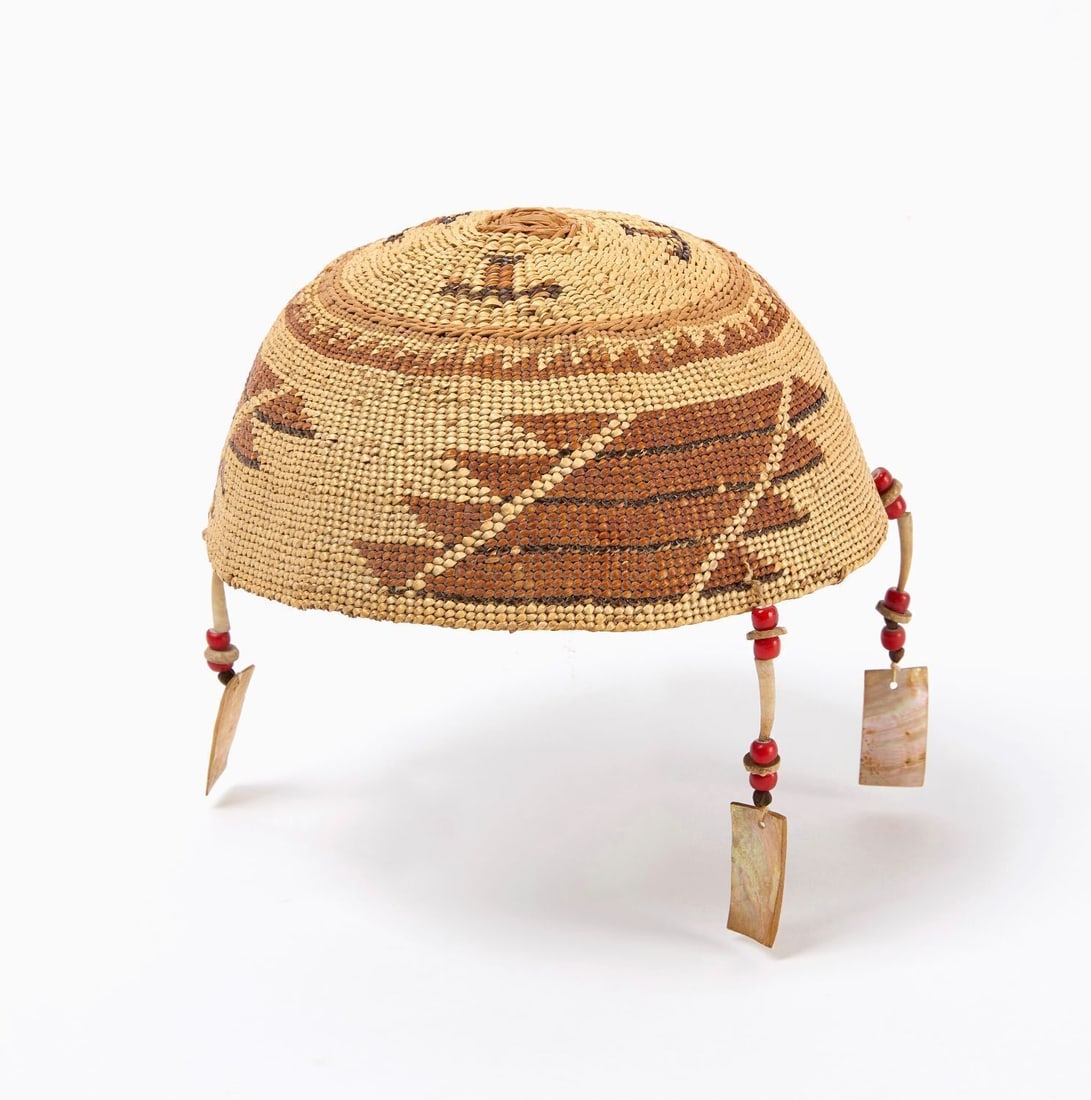 Northwest Coast Cap with Ornaments: Northwest Coast cap with three shell and bead ornaments attached with sinew. 19th century. D 6-7 in. 