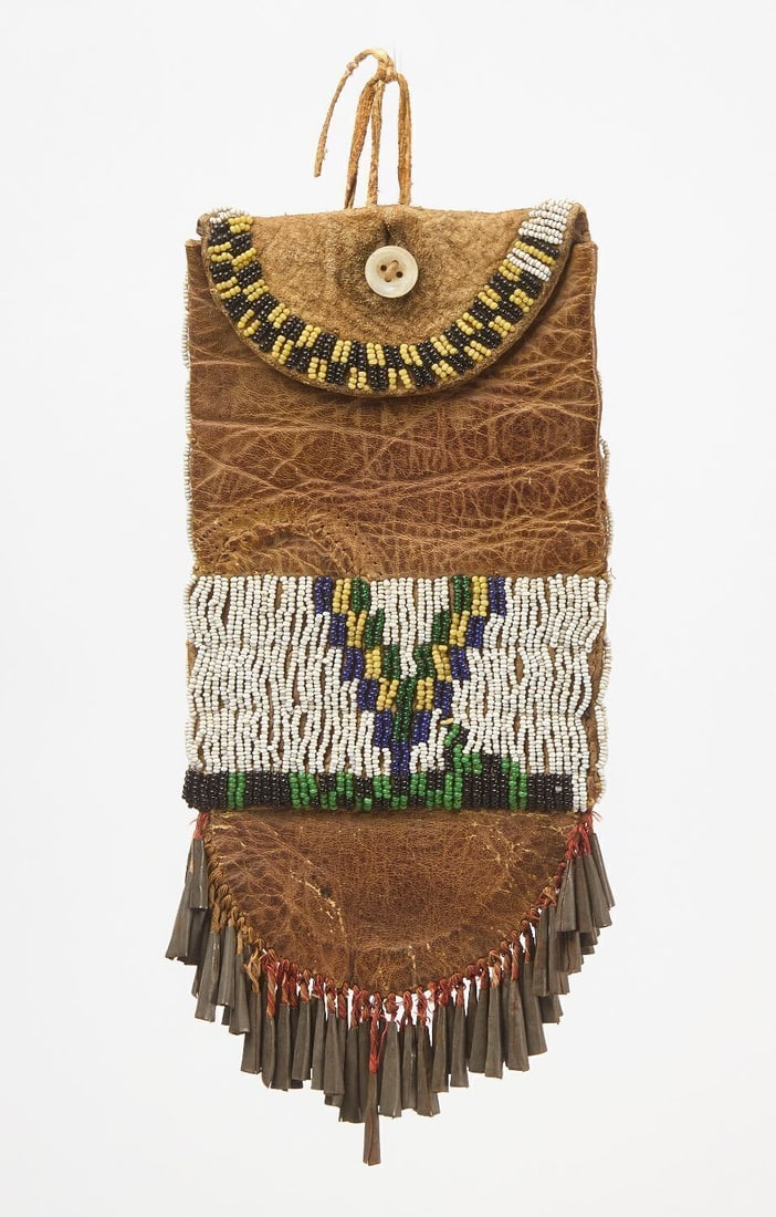 Beaded Bag on Calvary Hide: Beaded bag on calvary hide with tin cones. Sinew sewn. 19th century. L 9 in. W 4 in.