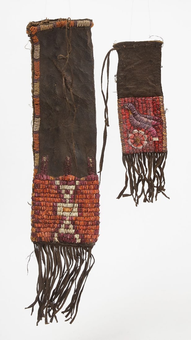 Quill Work Medicine Bag and Pipe Bag: Quill work medicine bag and pipe bag. Medicine bag with bird symbol. Quillwork on smoke tanned hide. L Medicine bag: 12 in. Pipe bag: L 23 in. Provenance: Ralph Edwards.