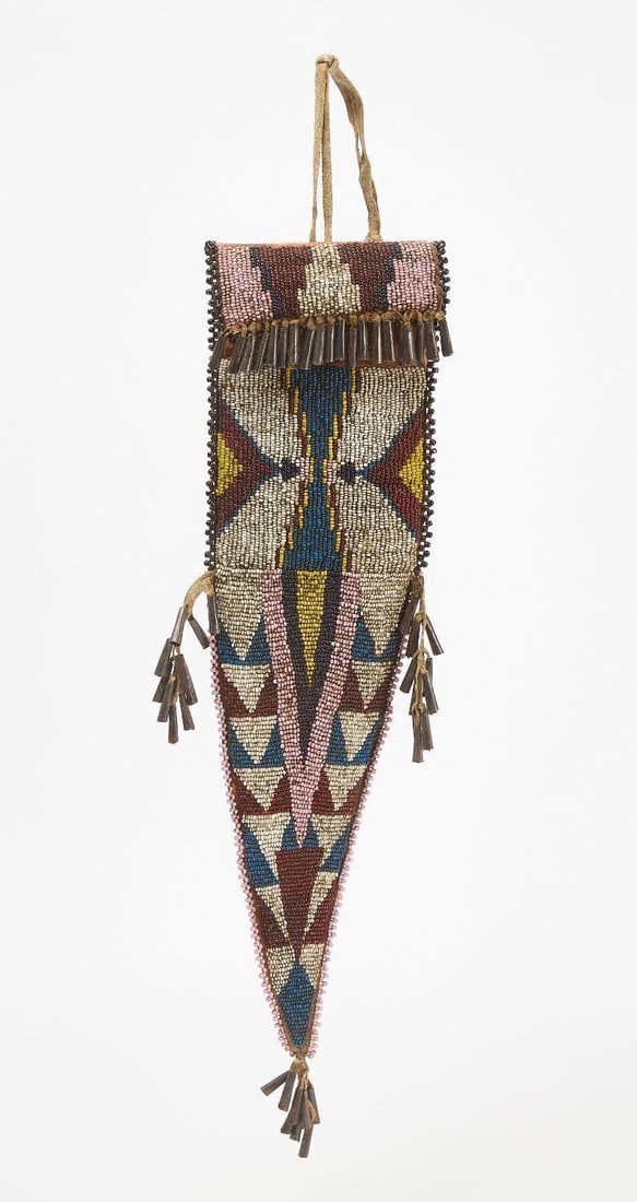Large Native Beaded Knife Sheath: Large Native beaded knife sheath. Glass beads on pigmented hide. Sinew sewn, circa 1900. L 16 in.