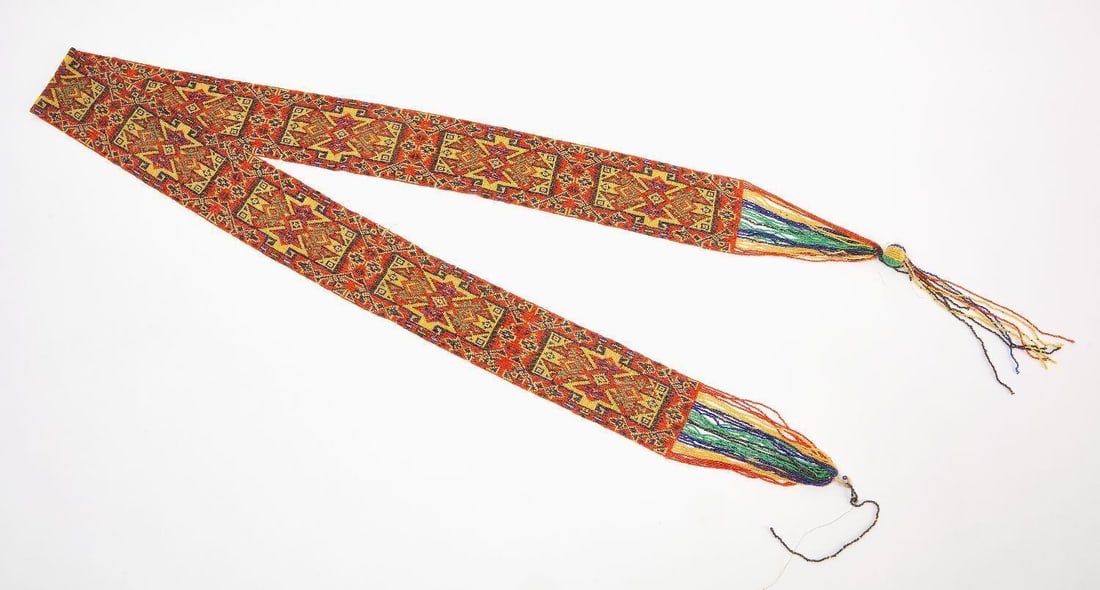 Beaded Belt: Loomed beaded belt with beaded fringe. Early 20th century. L 65 in. W 2-3/4 in.