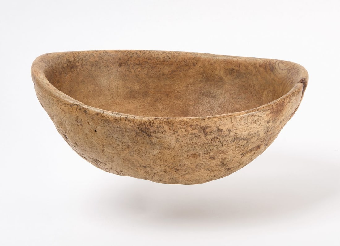 Native Carved Burl Bowl: Carved ash burl bowl. Native American, circa 1900. H 6-1/2 in. L 15-3/4 in. D 13 in.