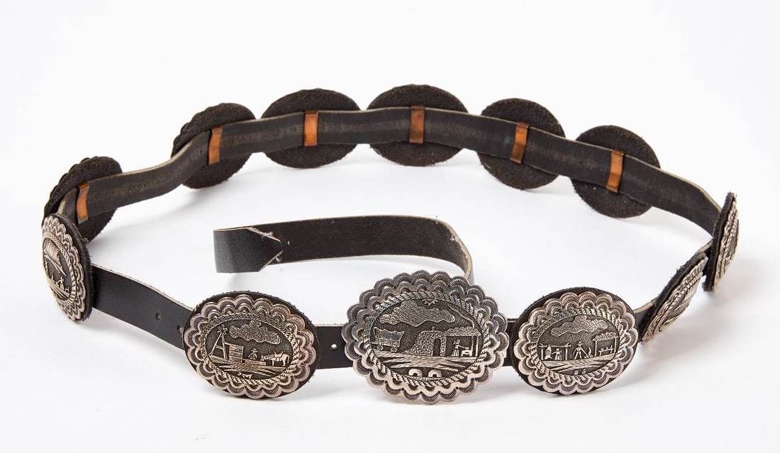 Leonard Maloney Sterling Silver Concho Belt: Leonard Maloney (stamped L-M) sterling silver concho belt. Segments depict various agricultural-inspired scenes. L 47 in. Weight (with leather belt): 10.325 ozt.