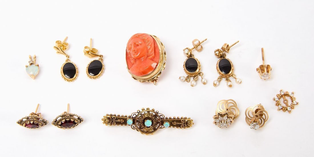 Group of 14k Gold Pins and Earrings: Group of 14k gold pins and earrings. Either stamped 14k or acid tested. Includes one set of garnet earrings, two sets of onyx and pearl drop earrings, one gold and opal pin with carved sunburst, one c