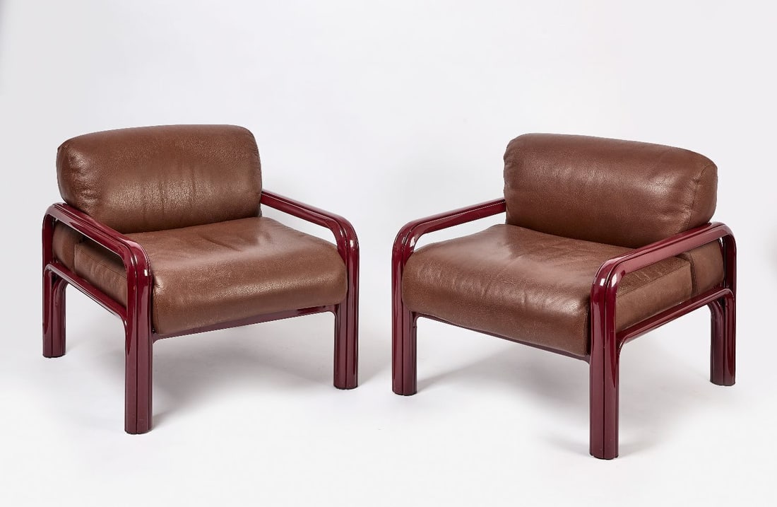 Pair of Gae Aulenti for Knoll Armchairs: Pair of armchairs by Gae Aulenti for Knoll International, in burgundy frame and brown leather upholstery. Model 54S. Painted steel frame. From the "Orsay Collection" (also called