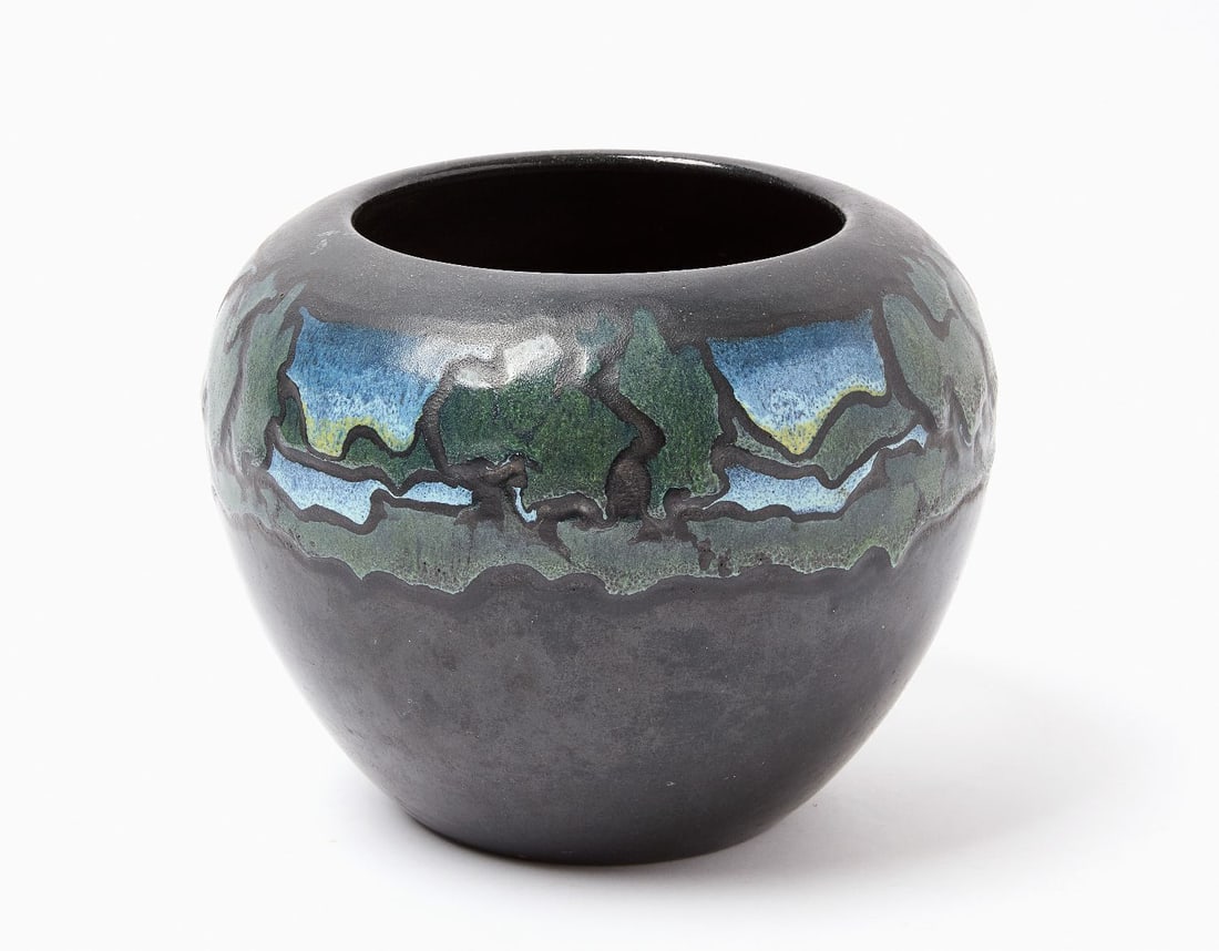 Saturday Evening Girls Pottery Jar: Saturday Evening Girls (SEG) pottery jar. Signed 'Eva Geneco' underneath. Glaze depicts a landscape with river and trees. H 7 in. (Mouth) D 5-1/8 in.