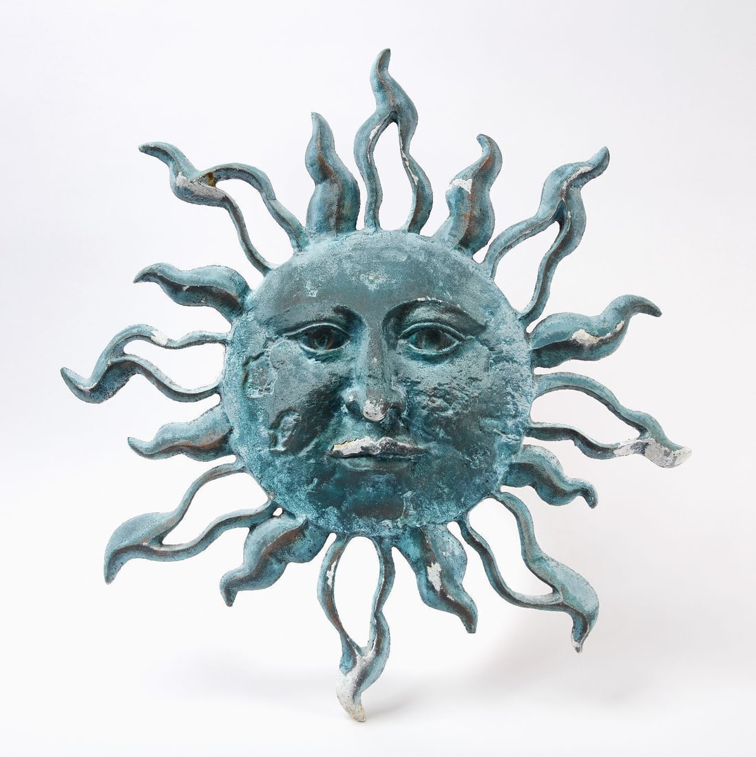 Sun Face Plaque: Sun Face Plaque. Cast zinc. Mid-20th century. H 30-1/2 in. W 29 in.