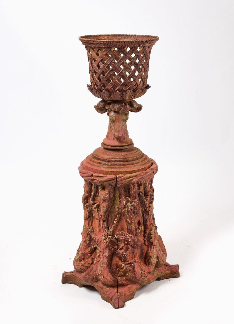 Janes Beebe & Co Figural Garden Planter: Janes Beebe & Co NY (signed) figural garden planter. Cast iron with remnants of old red and green paint. Top in the form of a woven basket, sitting atop a deer head. Base resembles a tree trunk.