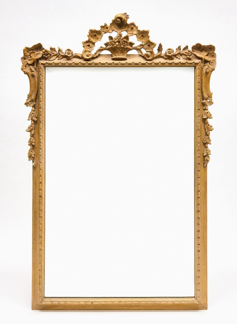 F. J. Newcomb Rocaille Style Mirror: Mirror with rocaille and floral style elements. Retains F. J. Newcomb label on reverse. Molded plaster and composite composition. 20th century. H 41 in. W 27 in. Mirror: H 31-1/2 in. W 20-1/2 in.