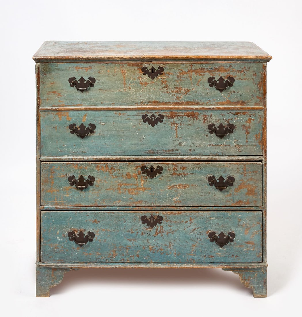William and Mary Blanket Chest in Blue Paint: William and Mary blanket chest with two drawers. Single arched molding. Top with snipe hinges and two false drawers over two lower drawers. Pine. American, circa 1720. Paint is 19th century. H 38-1/8