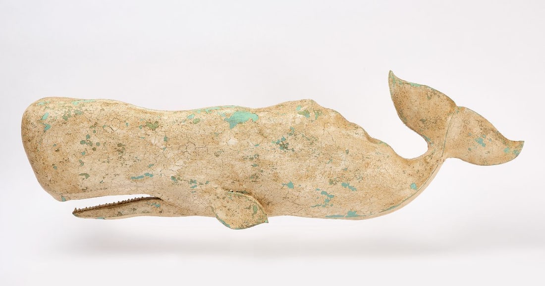 Large Carved Whale Plaque: Large Carved Whale Plaque. White paint over aqua blue paint on carved wood. Unsigned. American, mid-20th century. H 11 in. L 45-1/2 in. 
