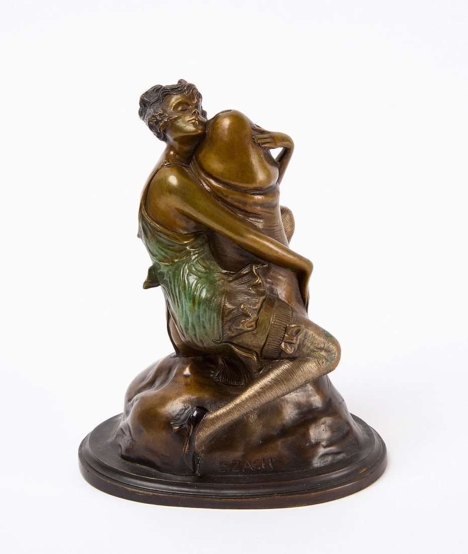 Bruno Zach - 'The Hugger' Erotic Bronze: Bruno Zach (Austrian, 1891–1945) 'The Hugger'. Erotic cold-painted bronze sculpture of a woman embracing a large phallus. Signed B. Zach on base. H 6-3/4 in. W 5-3/8 in. D 3-5/8
