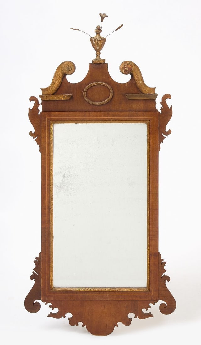 Broken Arch Mirror with Vase Finial: Broken arch mirror with vase finial. Mahogany or walnut. English, early 19th century. H 48-1/2 in. W 22-1/2 in.