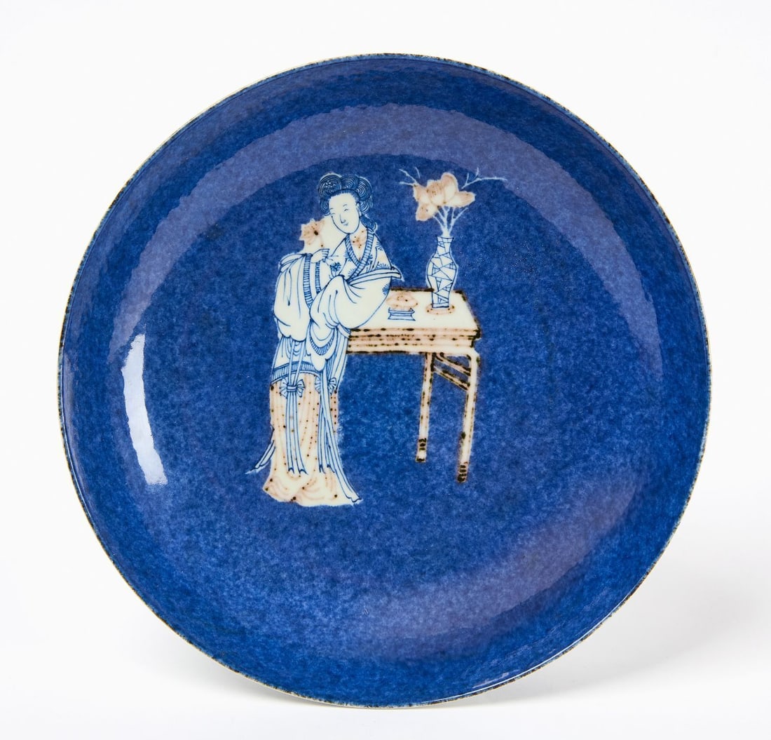 Qing Dynasty Blue and White Dish with Meiren Figure: Powder-blue ground with reserved white meiren figure at table. Single floral sprig mark within double circle to base. Gallery inventory sticker to underside. Qing Dynasty, Kangxi period. Diameter