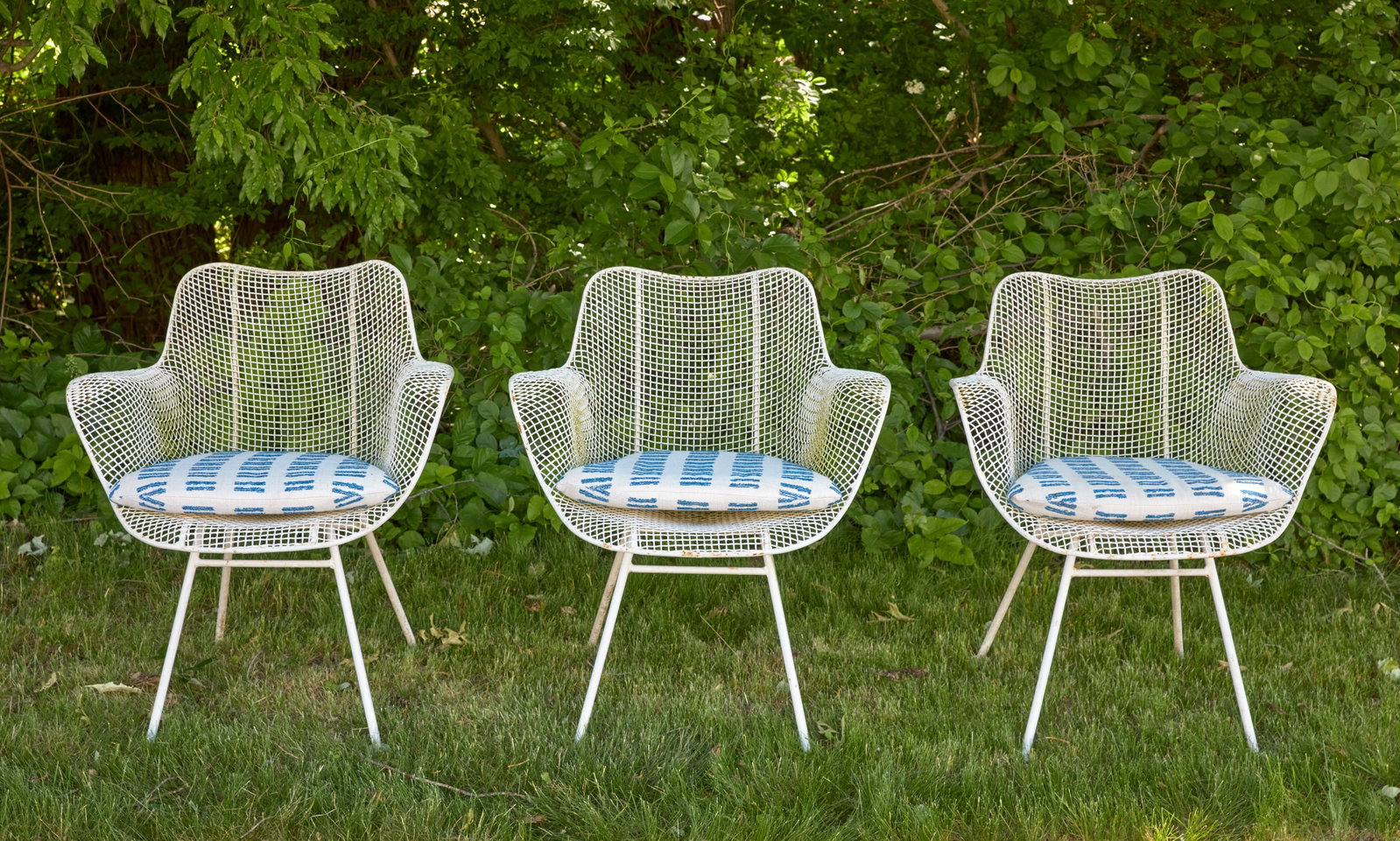 Three Outdoor Sculptura Dining Chairs: Set of Three Russell Woodard (1914–1983) Sculptura Dining Chairs. White enameled wrought iron with custom upholstery. American, mid-20th century.H 31-1/2 in. W 26-1/2 in. D 22 in. SH 16-1/2 in.