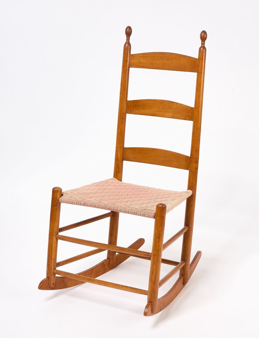 Shaker Rocking Chair: Shaker rocking chair with taped seat. New England, Late 19th century. Provenance: Estate of Faith and Andrew Deming Andrews. H 38 in. W 18-3/4 in. D 14-1/4 in. Faith and Edward Deming Andrews are wide