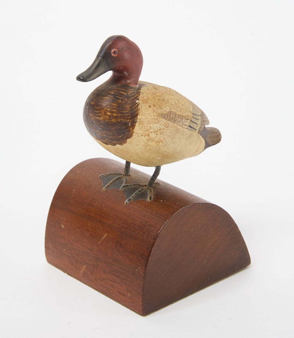 Miniature Carving of a Redhead Duck: Miniature carving of a redhead duck. Carved and painted wood on a lead-filled wood base. American, mid 20th century. Duck only: H 2-1/2 in. Overall: H 4 in. W 2-3/8 in. D 2-1/4 in.